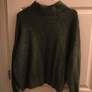 Green, chunky sweater